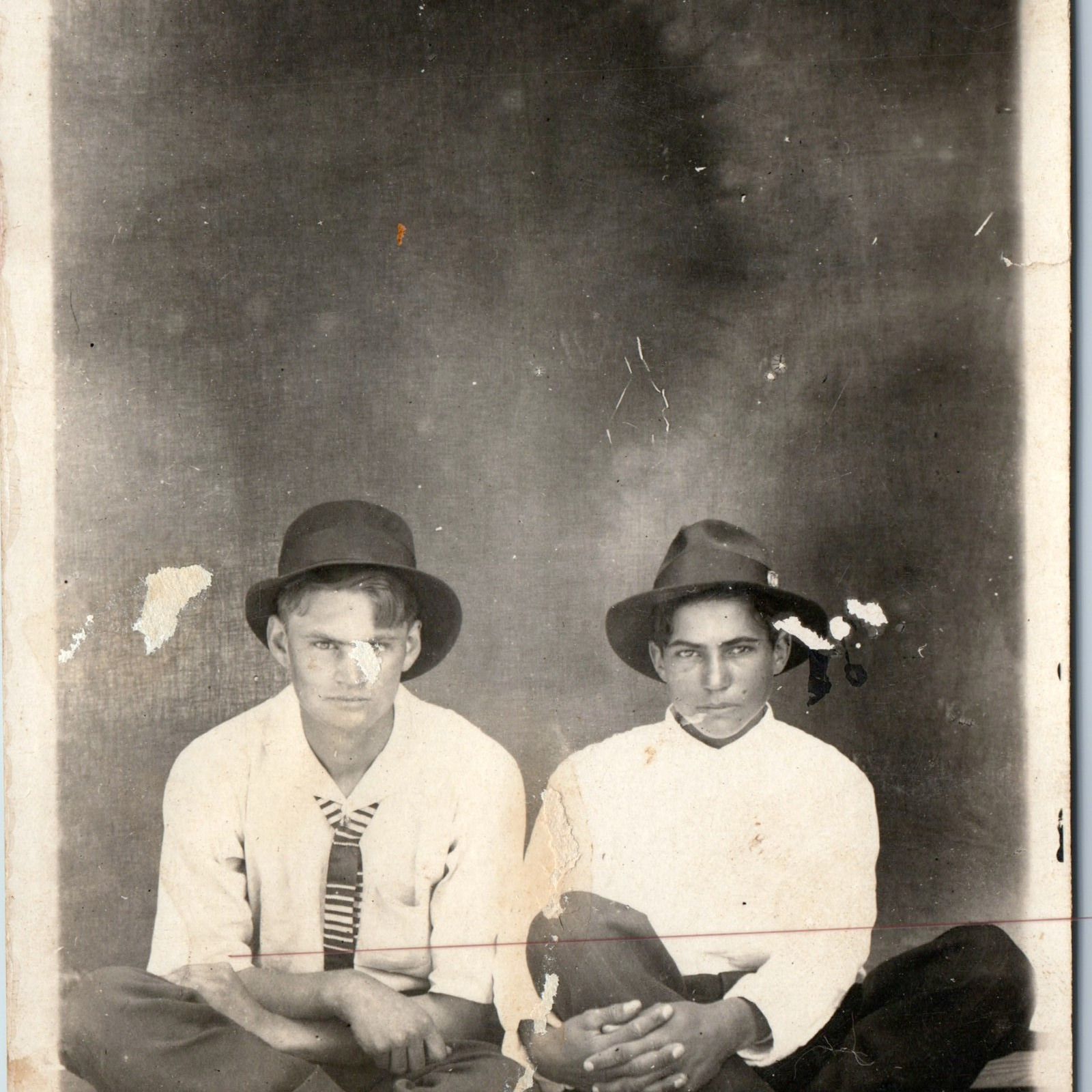 c1910s Unique Handsome Young Men Portrait RPPC Sitting Cross-Legged Rug Hat A213