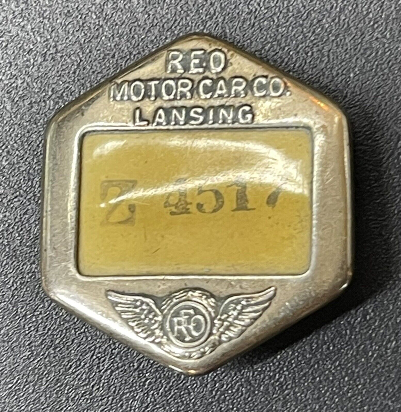 Vtg. REO MOTOR CAR CO. employee Badge ID metal pin holder