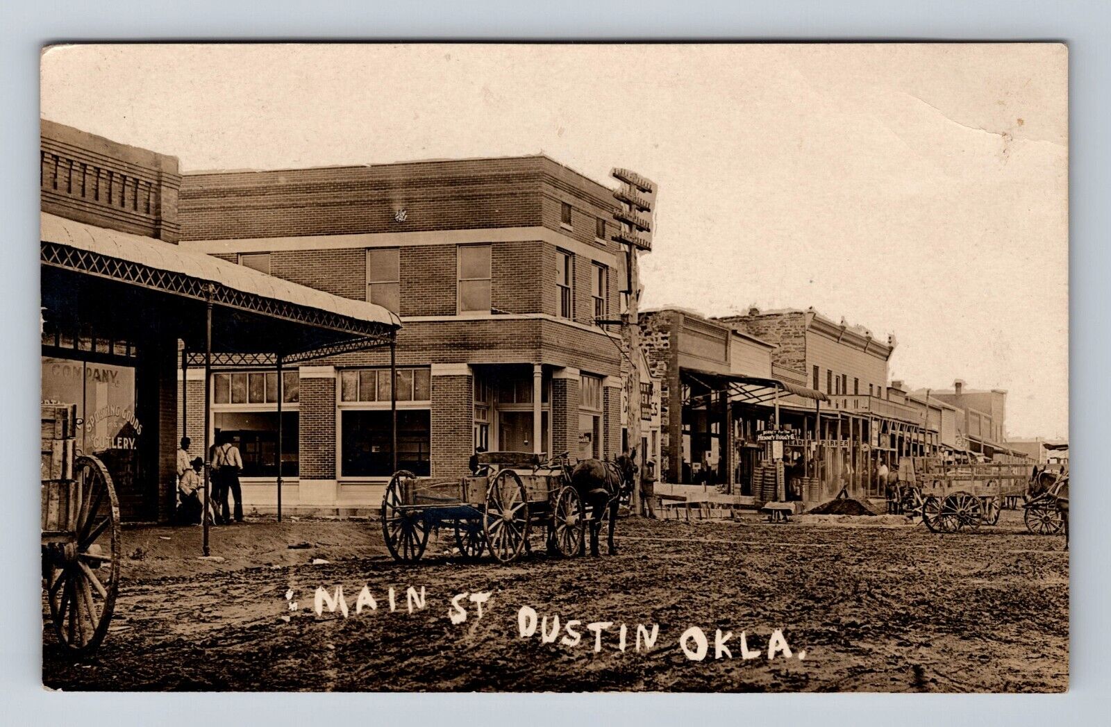 Dustin OK-Oklahoma, RPPC: Main Street, Old West, Wagons Vintage c1908 Postcard