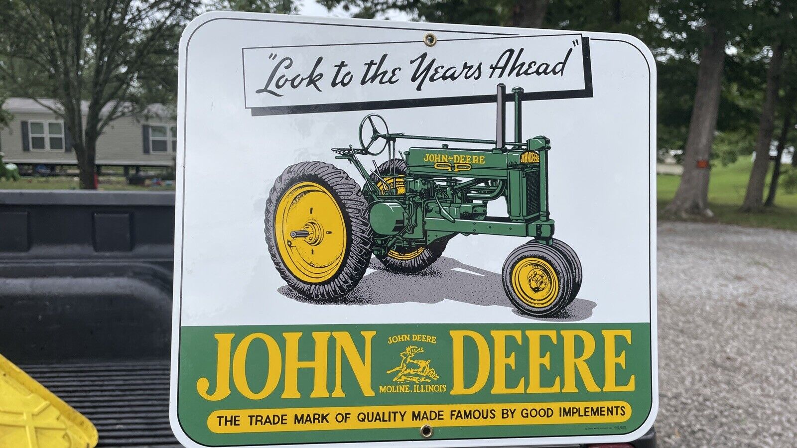 John Deere Tractor  Porcelain Sign Ande Rooney Advertising.
