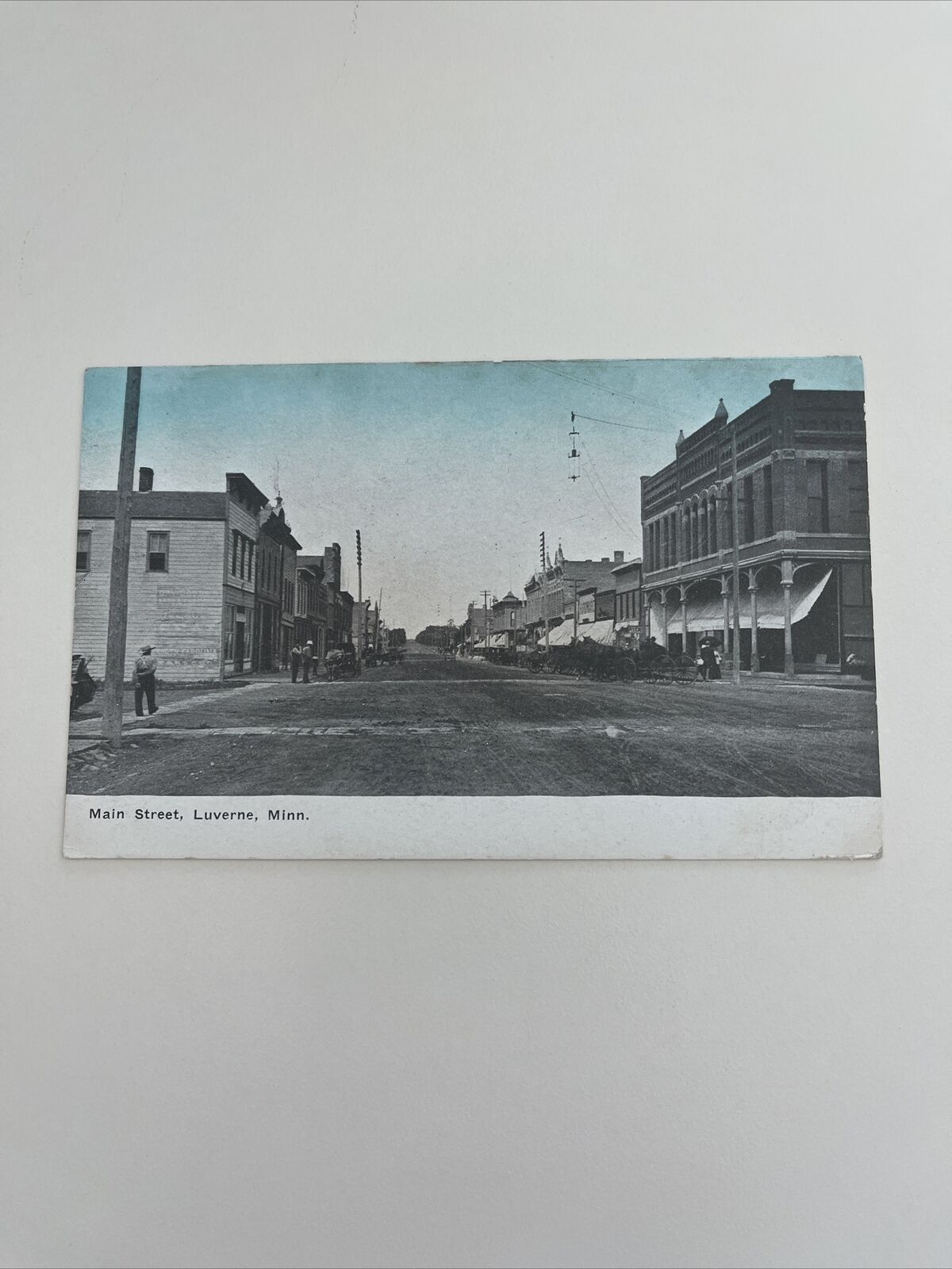 1911 Postcard--MINNESOTA--Luverne--Main Street--Horse Buggies Storefronts MN PC