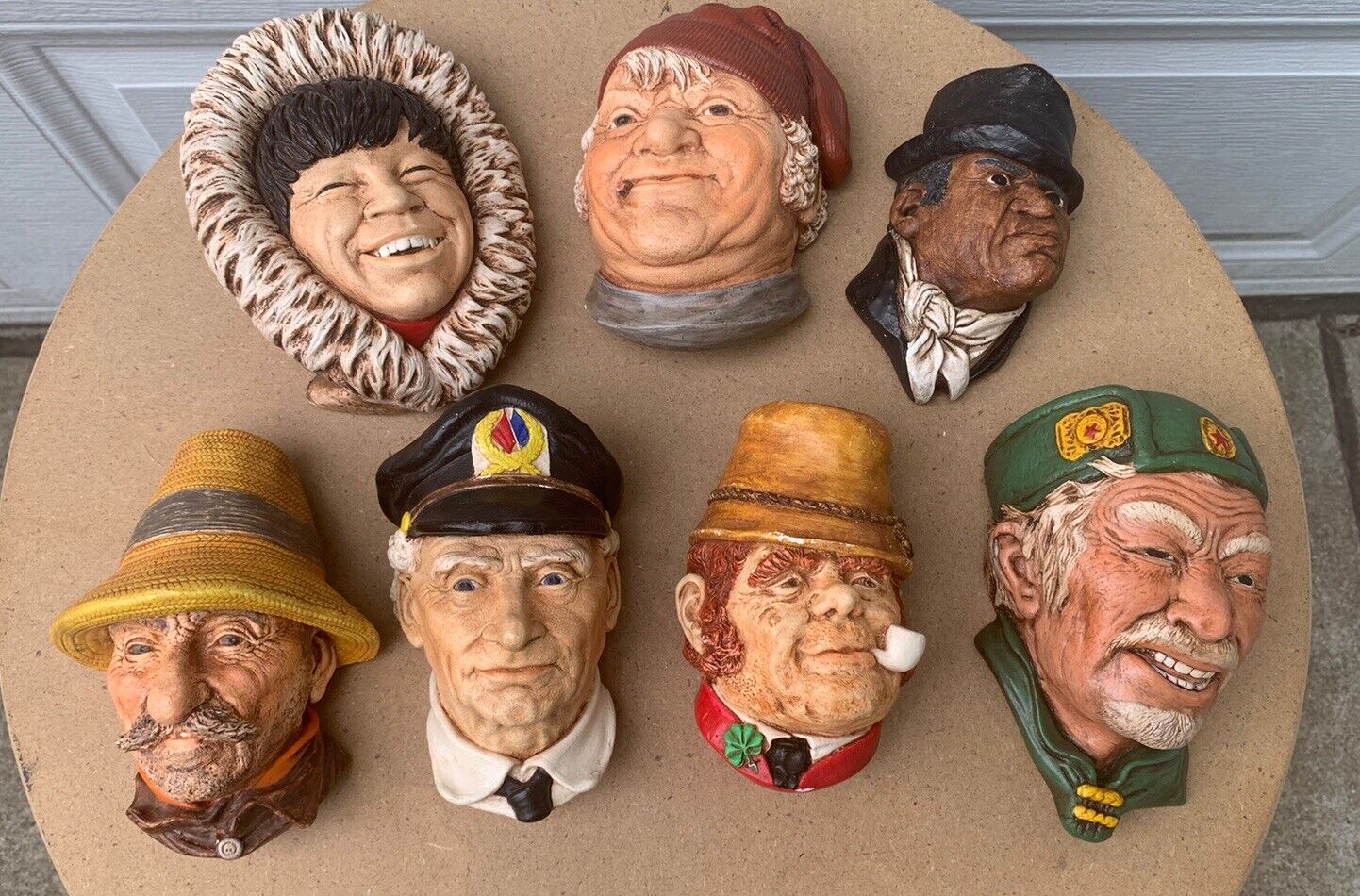 Lot of 7 BOSSONS Chalkware Heads Wall Hanging