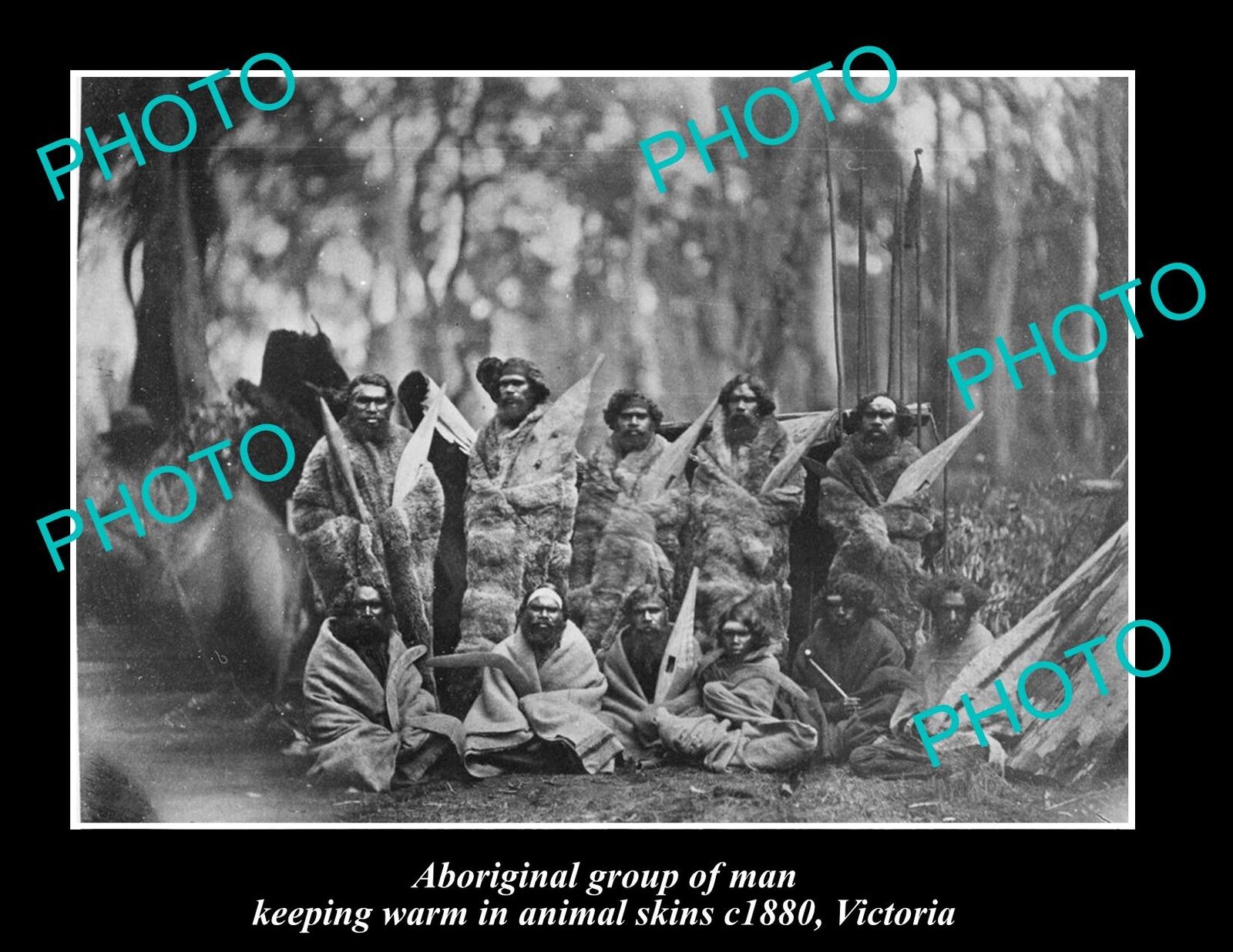 OLD 8x6 HISTORIC PHOTO OF ABORIGINAL MEN KEEPING WARM IN SKINS c1880