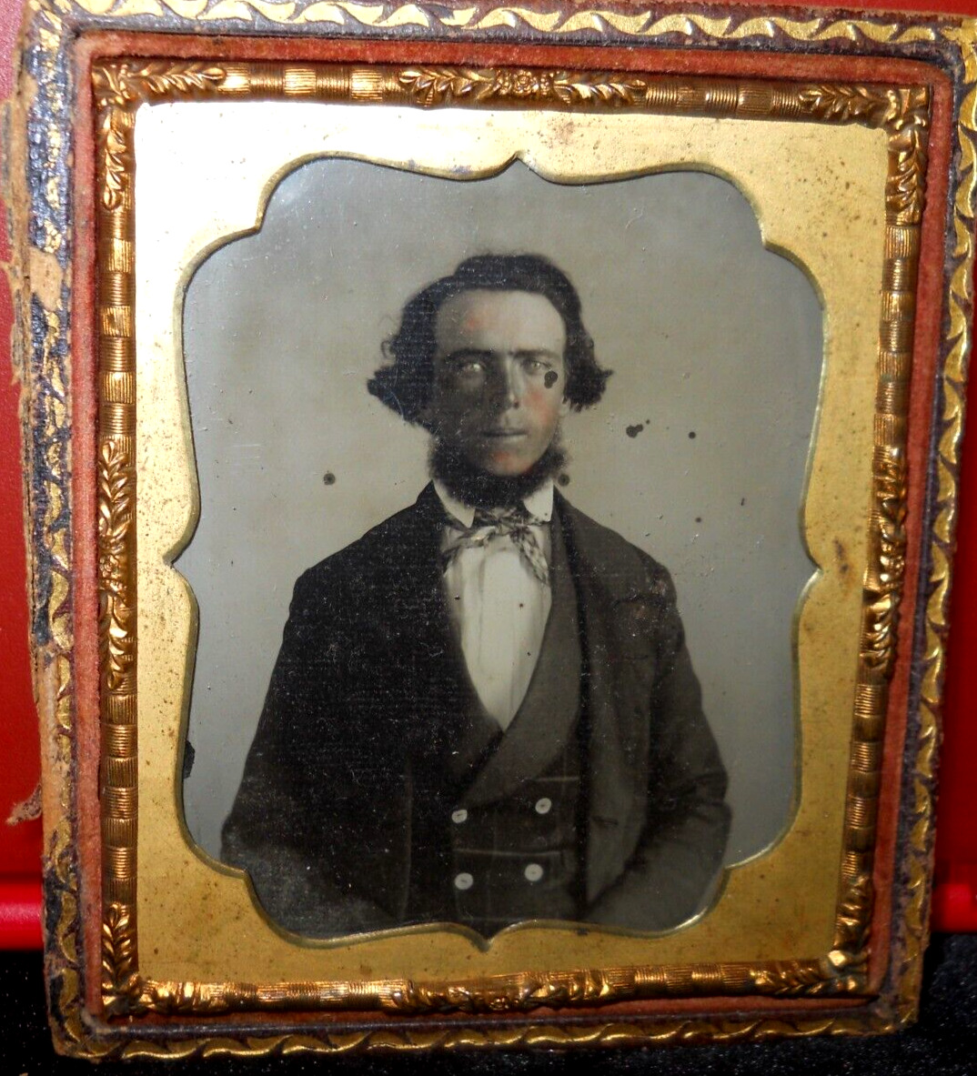 1/6th size Ambrotype of older man in half case
