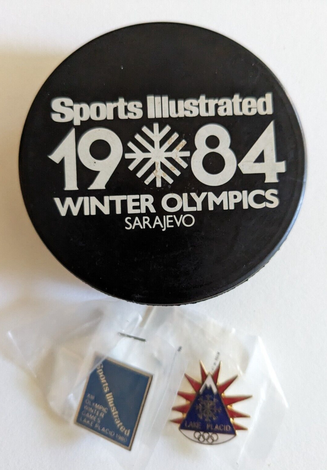 Winter Olympics-1980 Lake Placid & 1984 Sarajevo - Sports Illustrated puck/pins