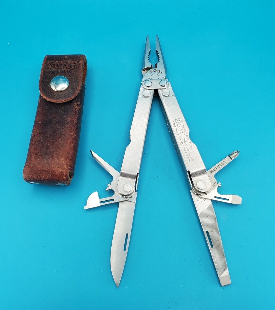 SOG U.S.A. Lynnwood, WA Multi Tool Folding Pocket Knife NICE WITH SHEATH
