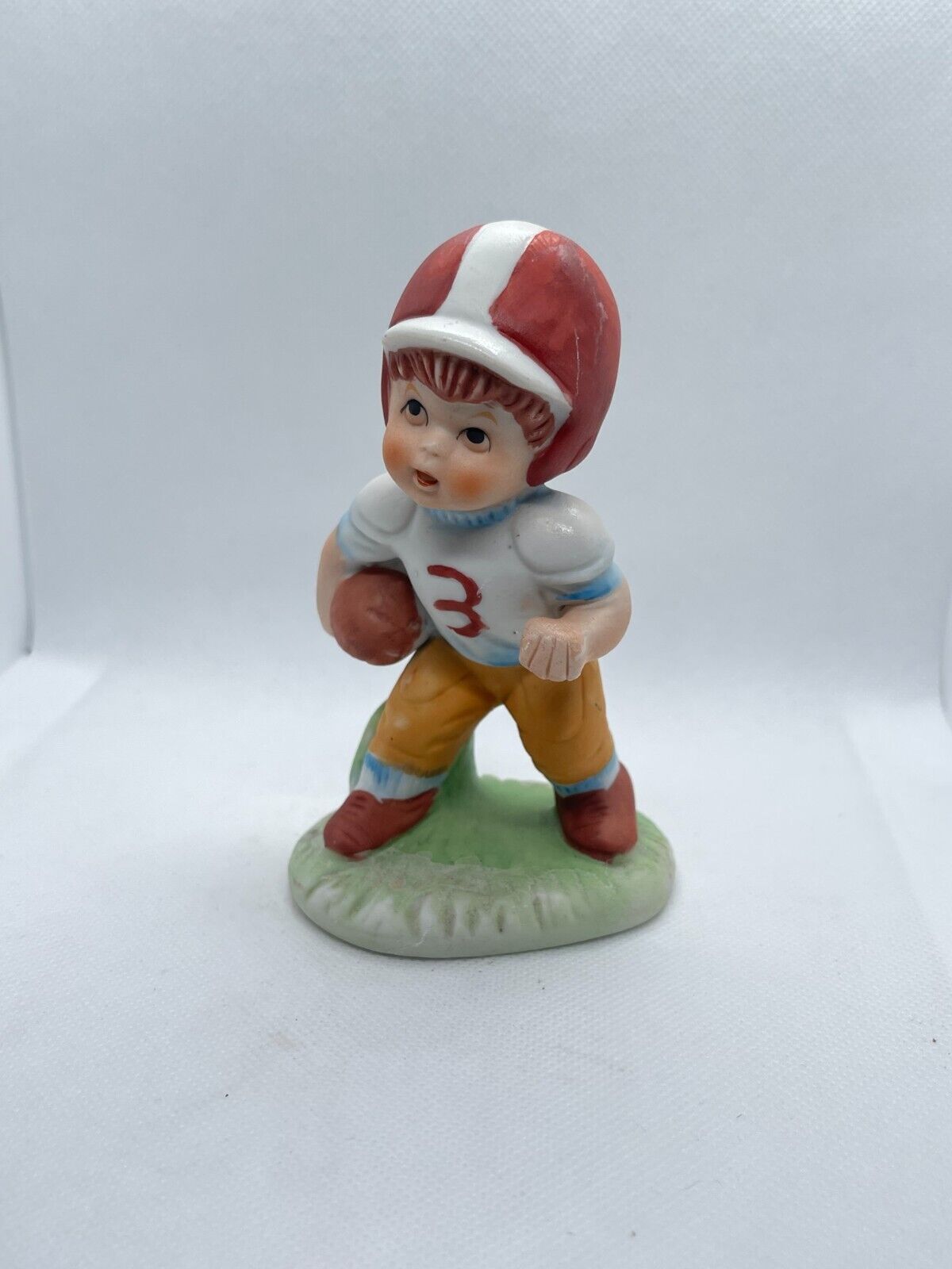 Vintage Brinns Porcelain Youth Football Player Figurine