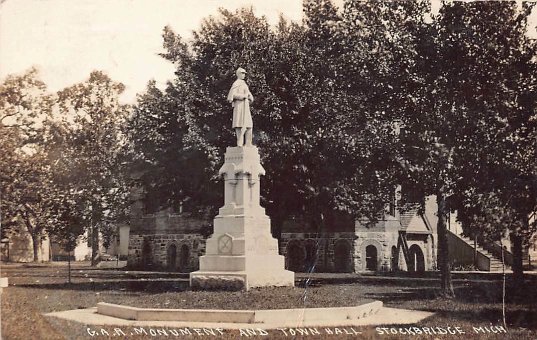 RPPC Stockbridge MI Michigan Town Hall Soldier Monument Photo Postcard c1911