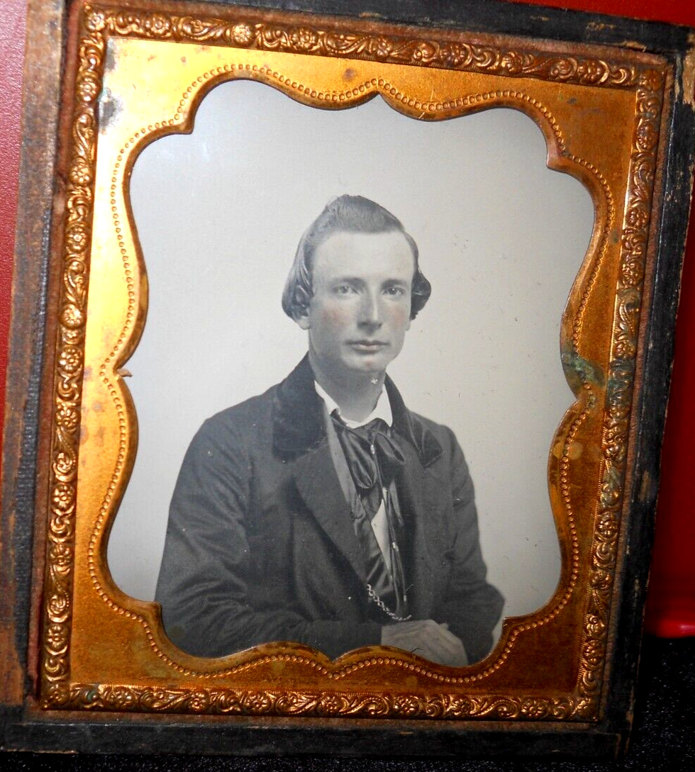 1/6th size Ambrotype of young man in half case