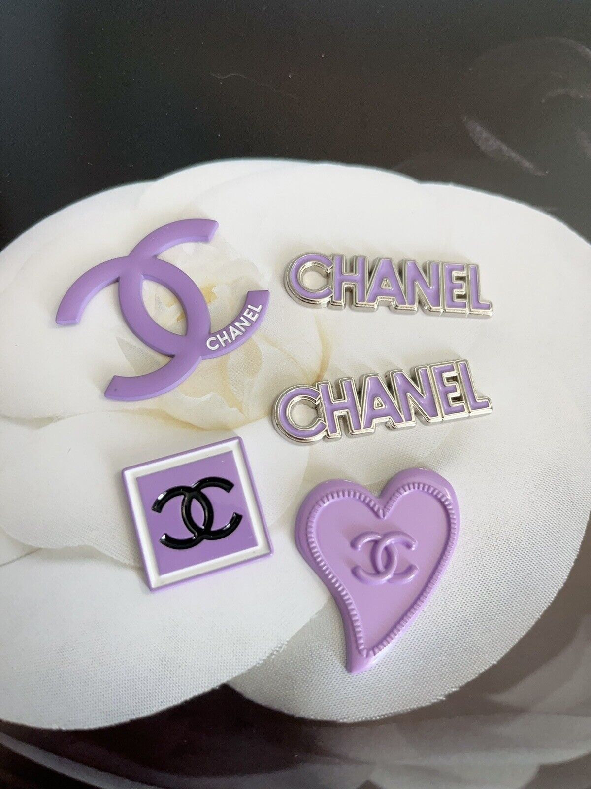 Lot of 5 Chanel buttons and zipper Pulls
