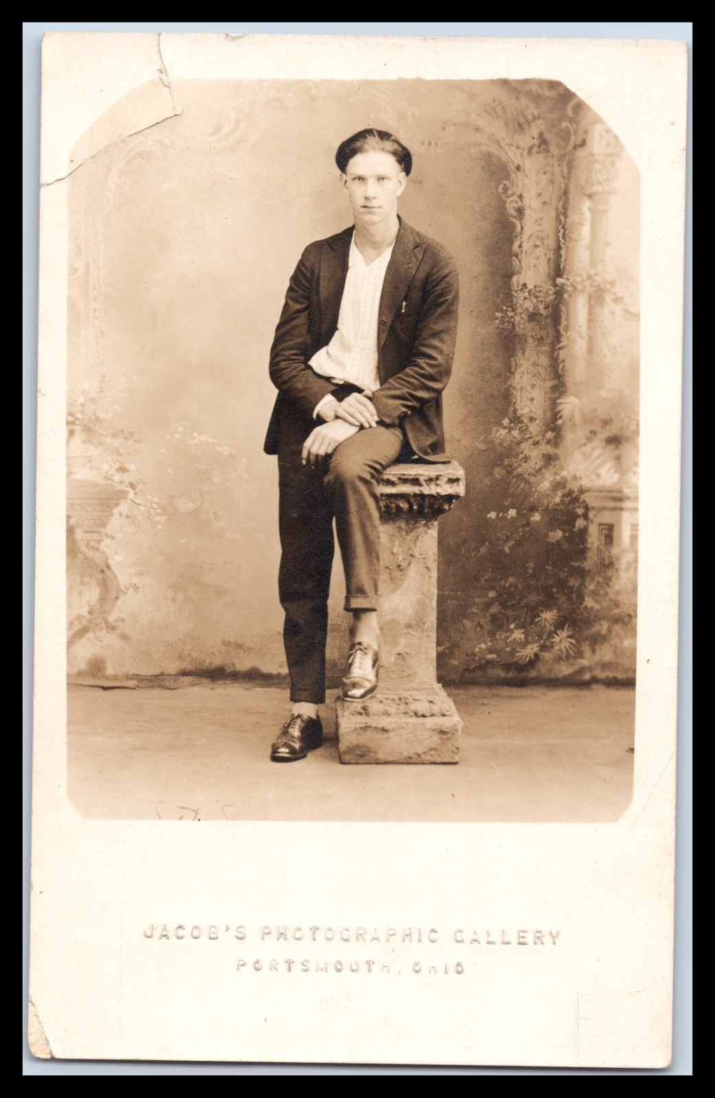 Vintage Sepia RPPC Man Sitting on Marble Column Early 1900s Jacob's Photographic