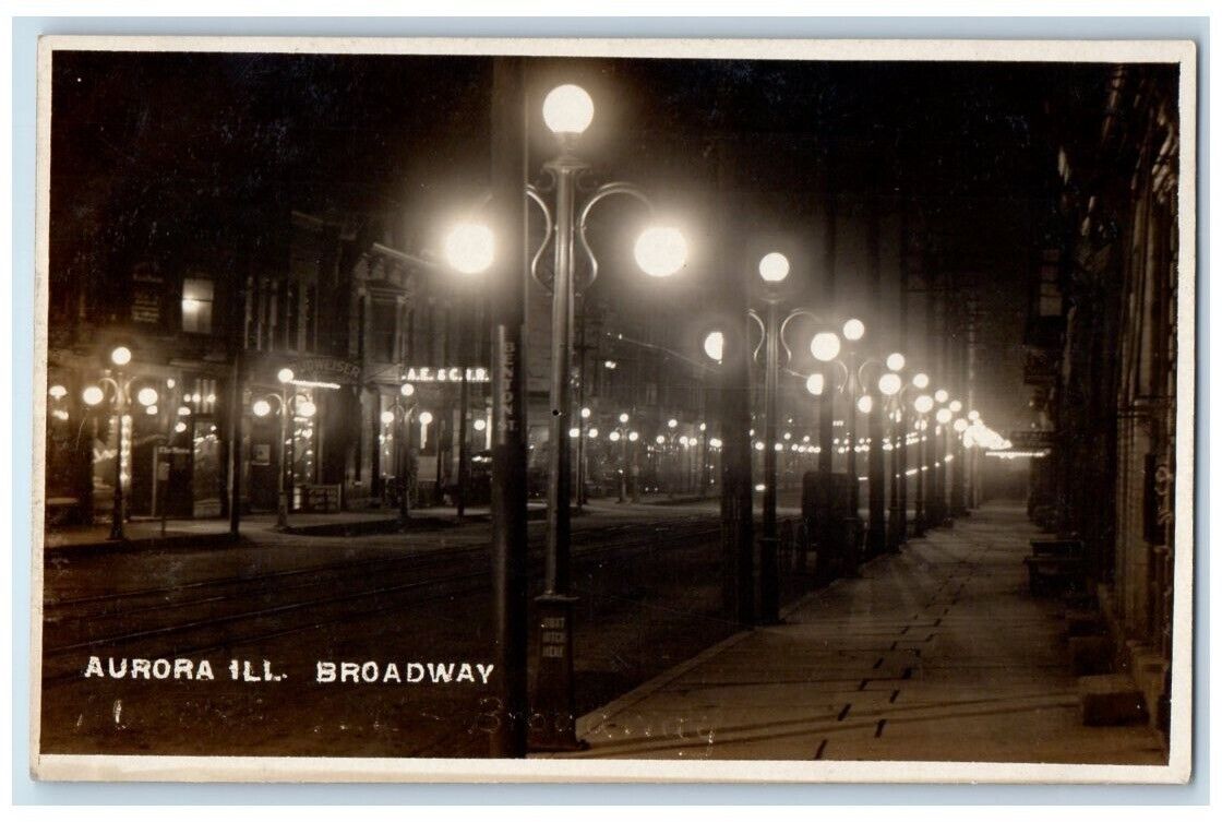 c1910's Broadway Night Street Lights Aurora Illinois IL RPPC Photo Postcard