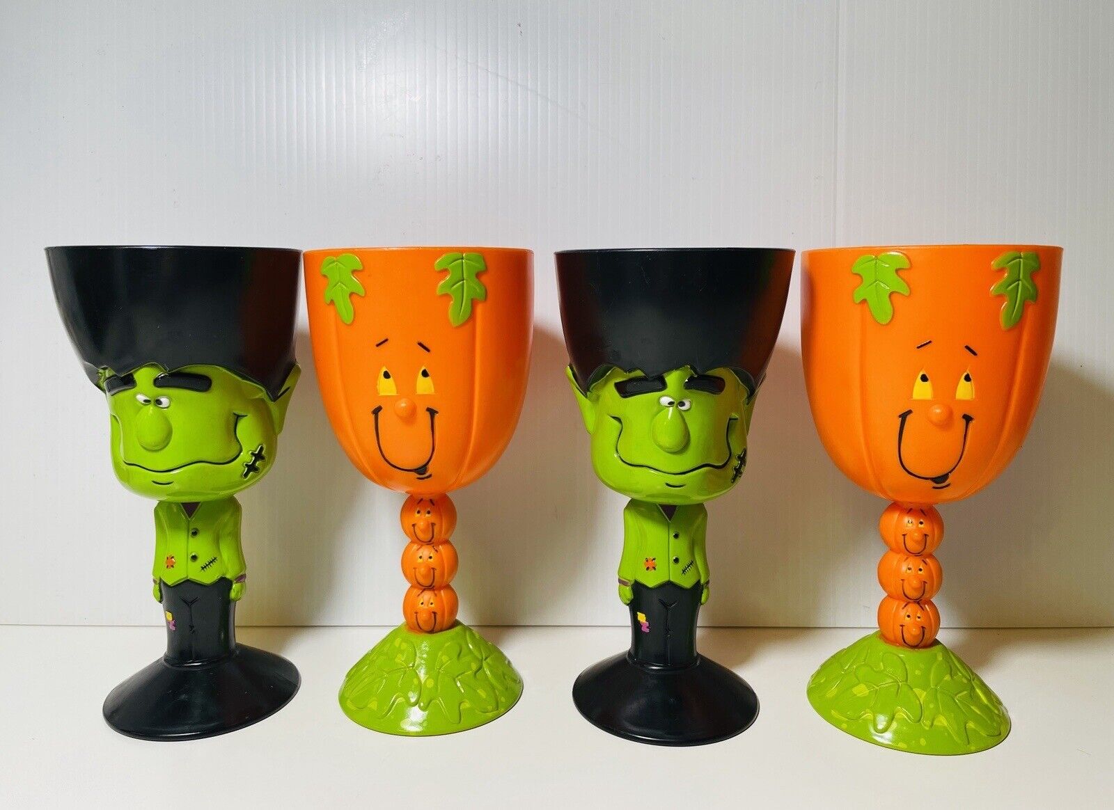 Lot of 4 Vintage Goth plastic Pumpkin & Frankenstein Halloween goblets 7”