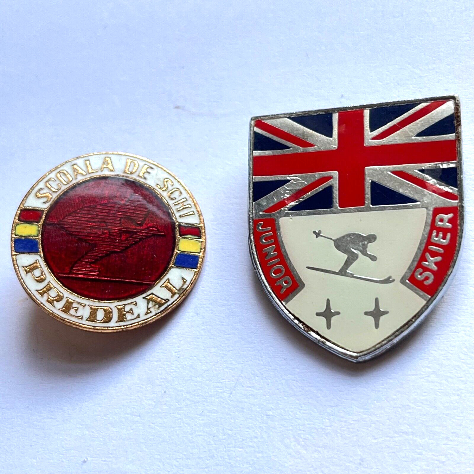 Two Vintage Enamelled Skiing Badges UK and Predeal Romania