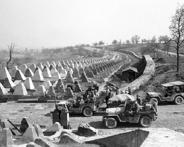 US Soldiers march through German Siegfried Line Defenses 8x10 WWII Photo 764a