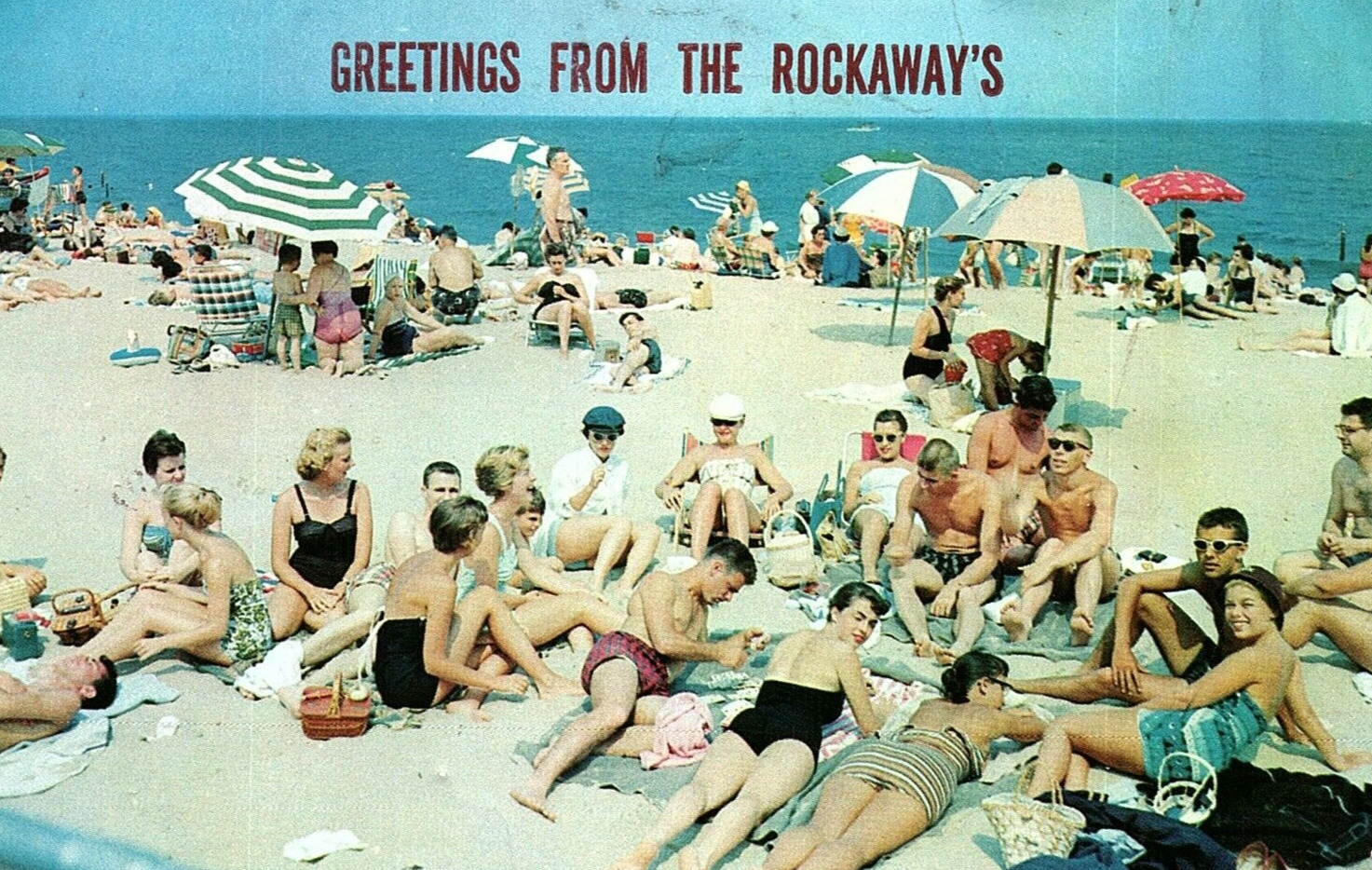 1960s ROCKAWAYS BEACH NEW YORK SWIMSUITS SUNBATHING SUMMER FUN POSTCARD P959