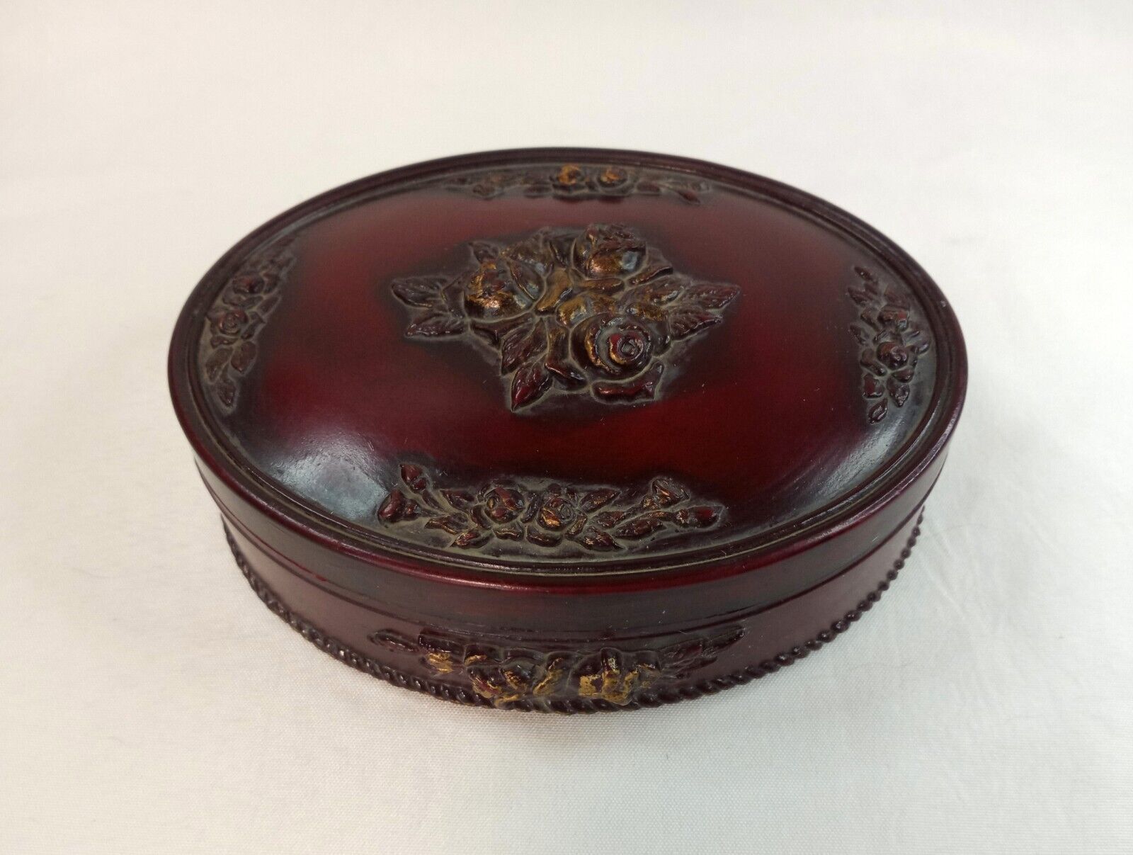 Vintage Burgundy Resin Oval Trinket Box Red Gold W/ Sculpted Floral Decorations 