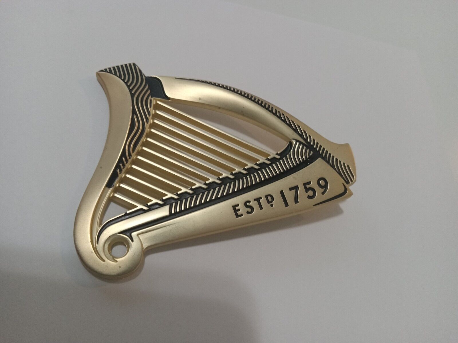 Guinness beer advertising display   Harp ( mini - cast metal )  paperweight ??