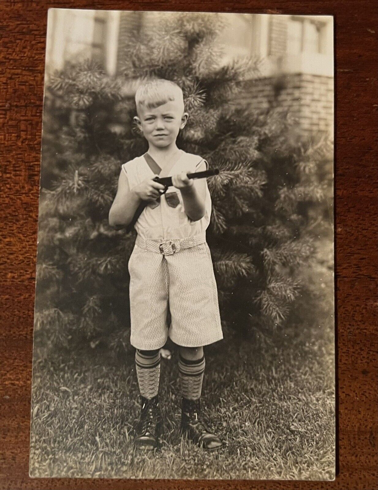 VTG c.1930 RPPC Postcard Small Child Boy Toy Gun Rifle White Shorts Vest Boots