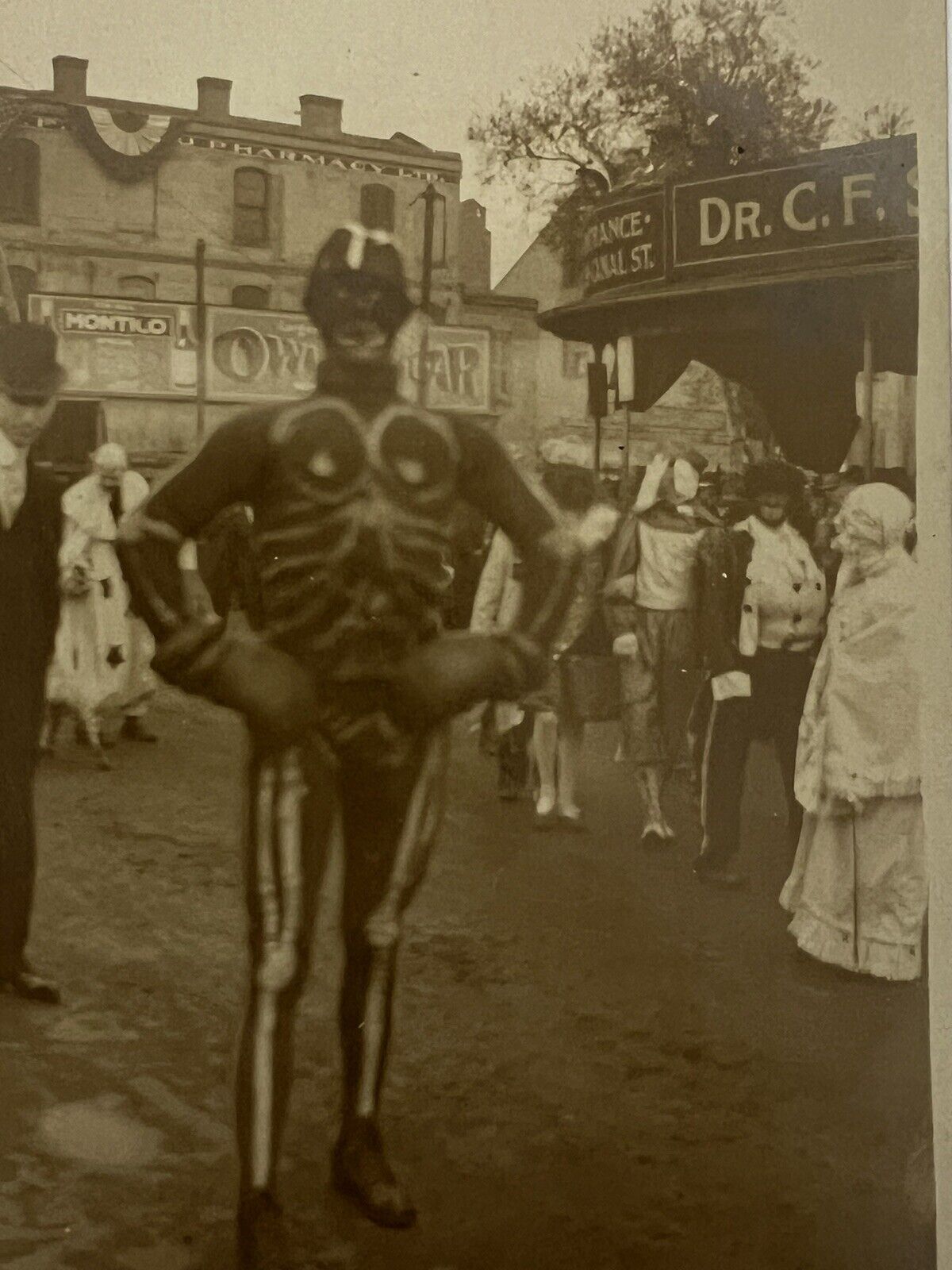 Rare Antique RPPC Photo Man In A SKELETON Costume At A City HALLOWEEN Parade