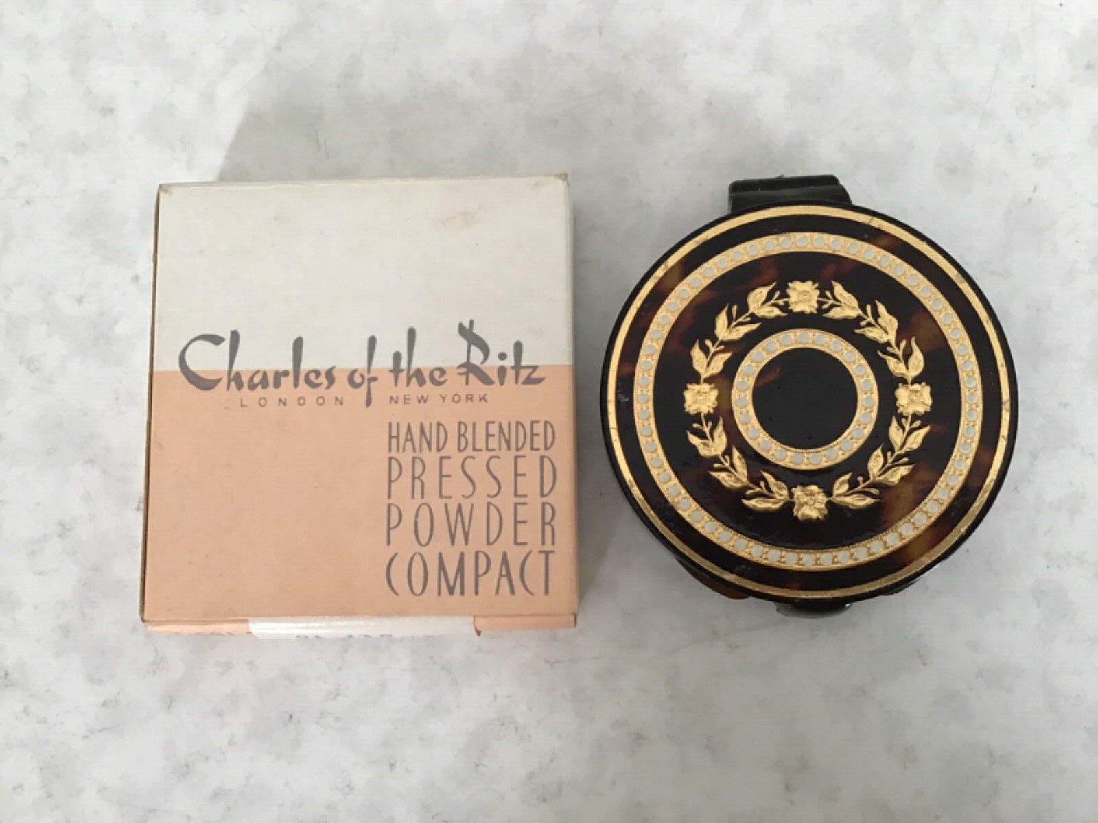 Vintage Charles of the Ritz powder compact new in original box