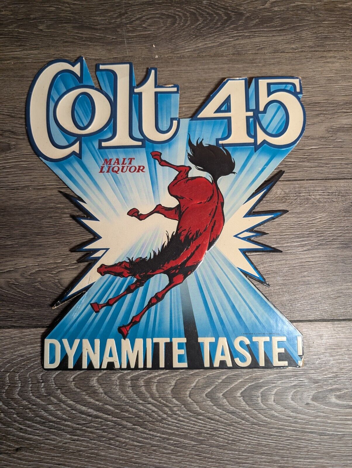 Colt 45 Malt Liquor Foil Cardboard Back Bar Beer Sign ManCave “Dynamite Taste”