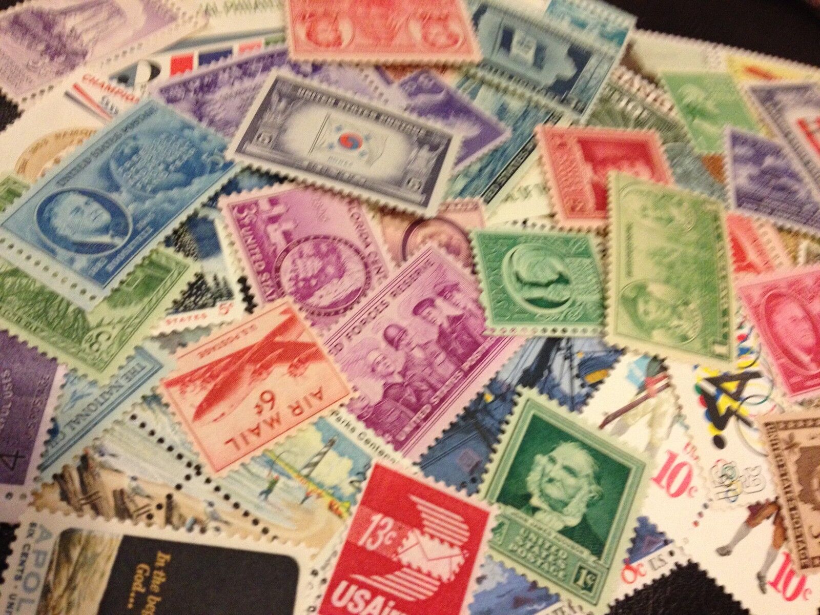 60 Unused US Stamps from 1930\'s to 60\'s including World War 2 era stamps