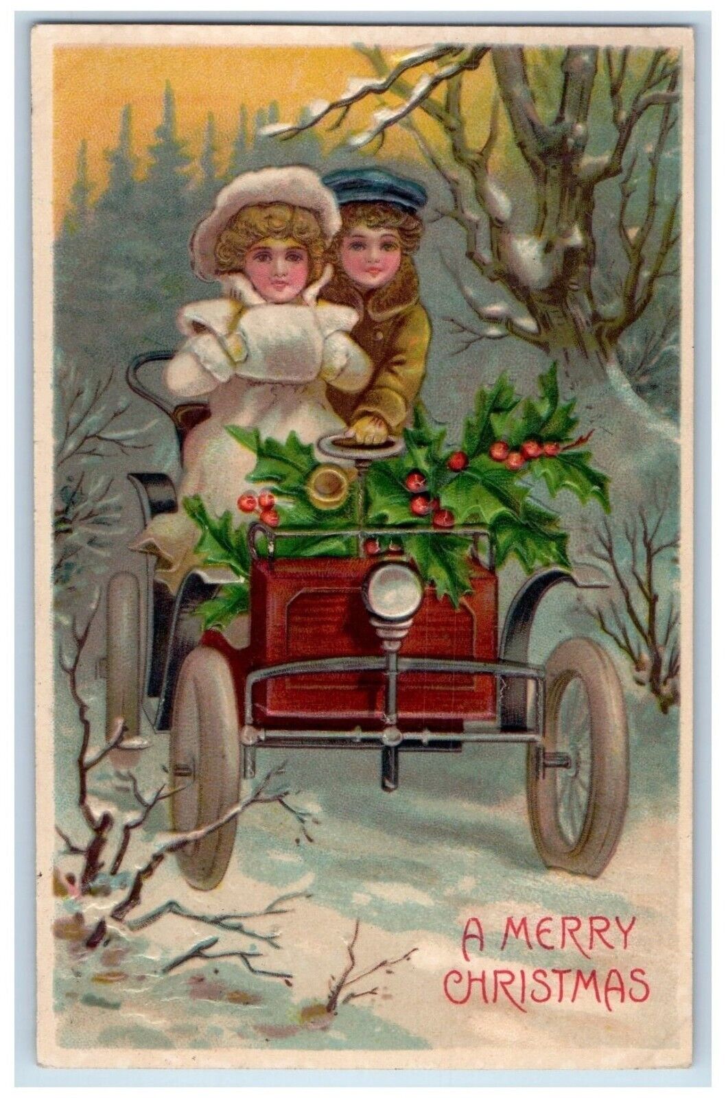c1910's Christmas Boy Girl Driving Car Handwarmer Holly Embossed Posted Postcard