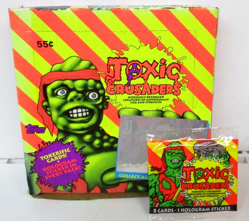 TOXIC CRUSADERS CARDS 1 SEALED CELLO PACK  1991 TOPPS-8 CARDS 1 HOLOGRAM STICKER