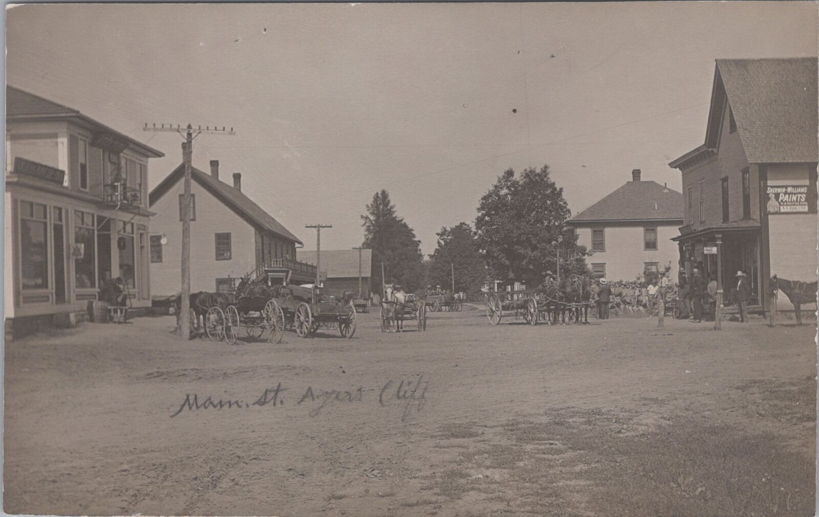 Main Street Ayer's Cliff Vermont? Sherwin Williams Paints c1910s RPPC Postcard