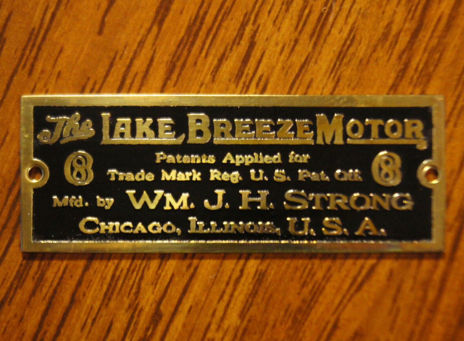 The Lake Breeze Motor - mfd by Wm J H Strong -Brass Fan Cage Badge, Reproduction