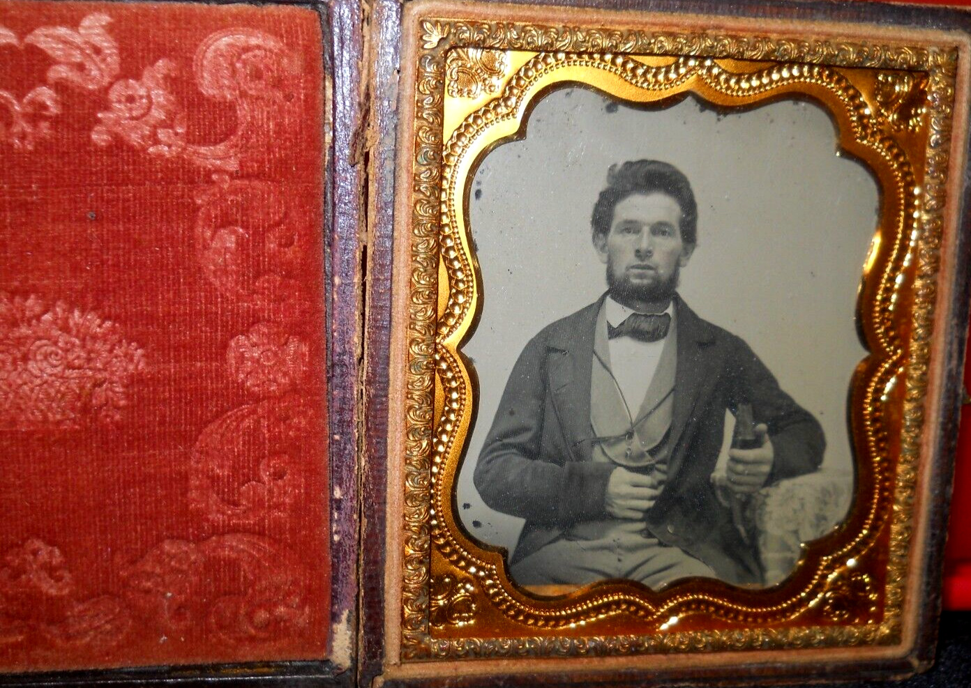 1/6th Size Ambrotype of young man in full case, split at hinge