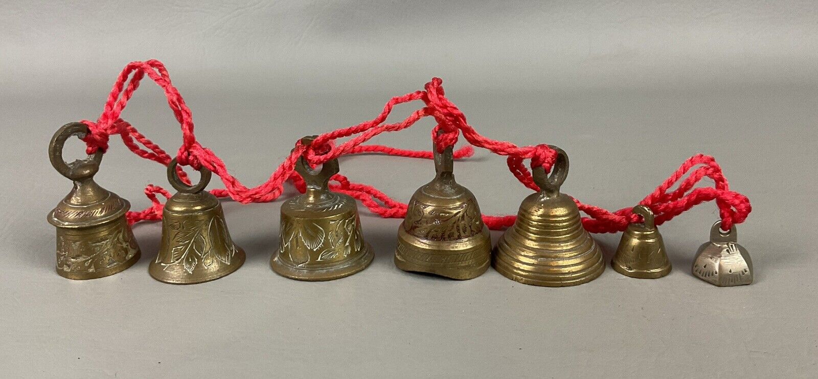 Beautiful seven piece brass Etched bell vintage collection great sound
