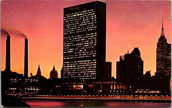 United Nations building at night New York City postcard