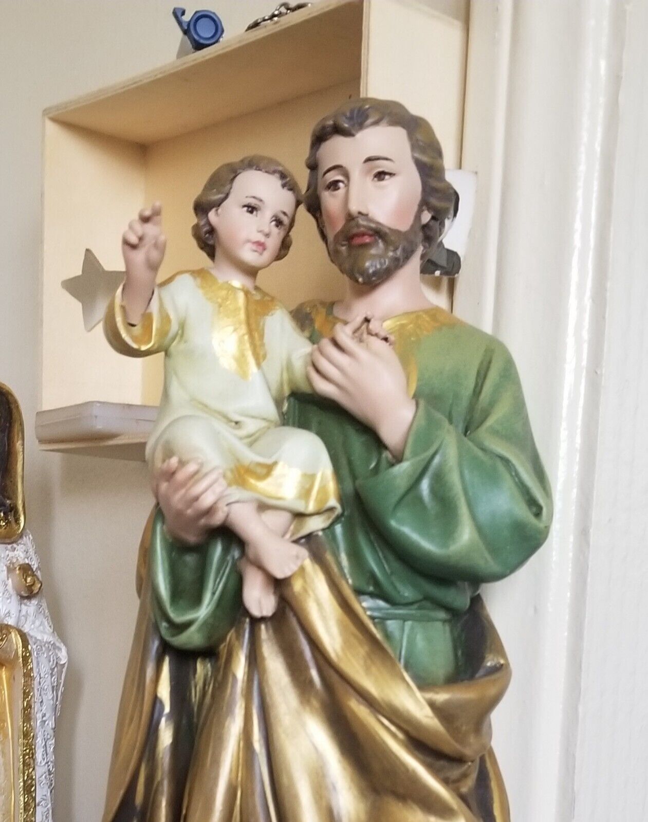 san jose with baby jesus statue
