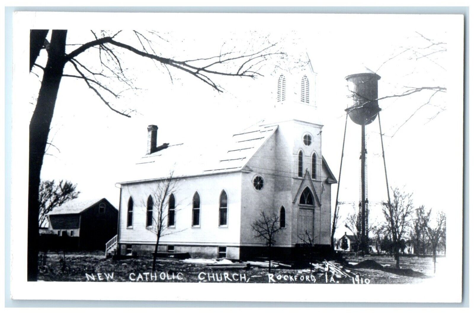 c1950's New Catholic Church Water Tower Rockford Iowa IA RPPC Photo Postcard
