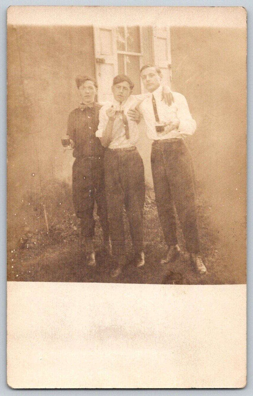 RPPC Postcard~ Three Young Men Holding Drinks