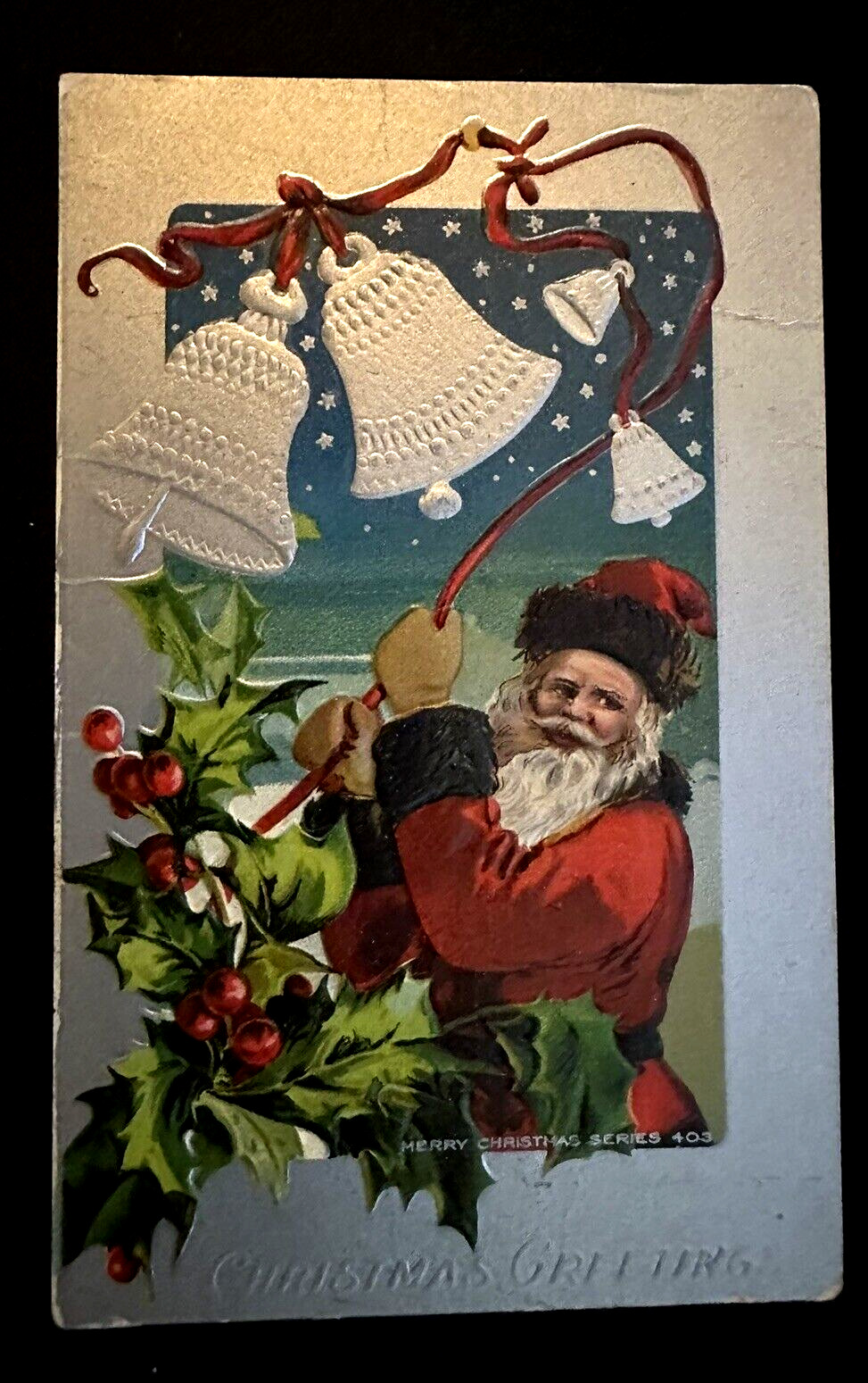 Santa Claus  Rings Bells ~Holly~Antique Embossed Christmas~Postcard~k373