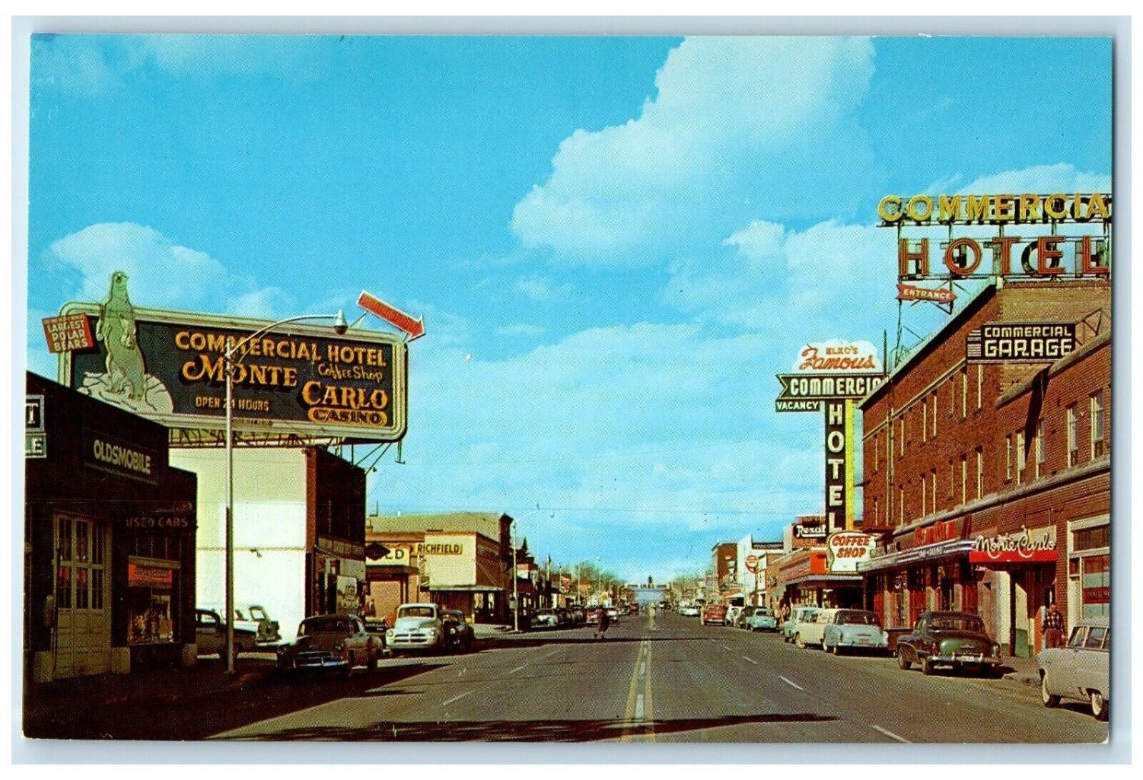 c1960 Looking East Idaho Street Elko's Main Commercial Hotel Nevada NV Postcard