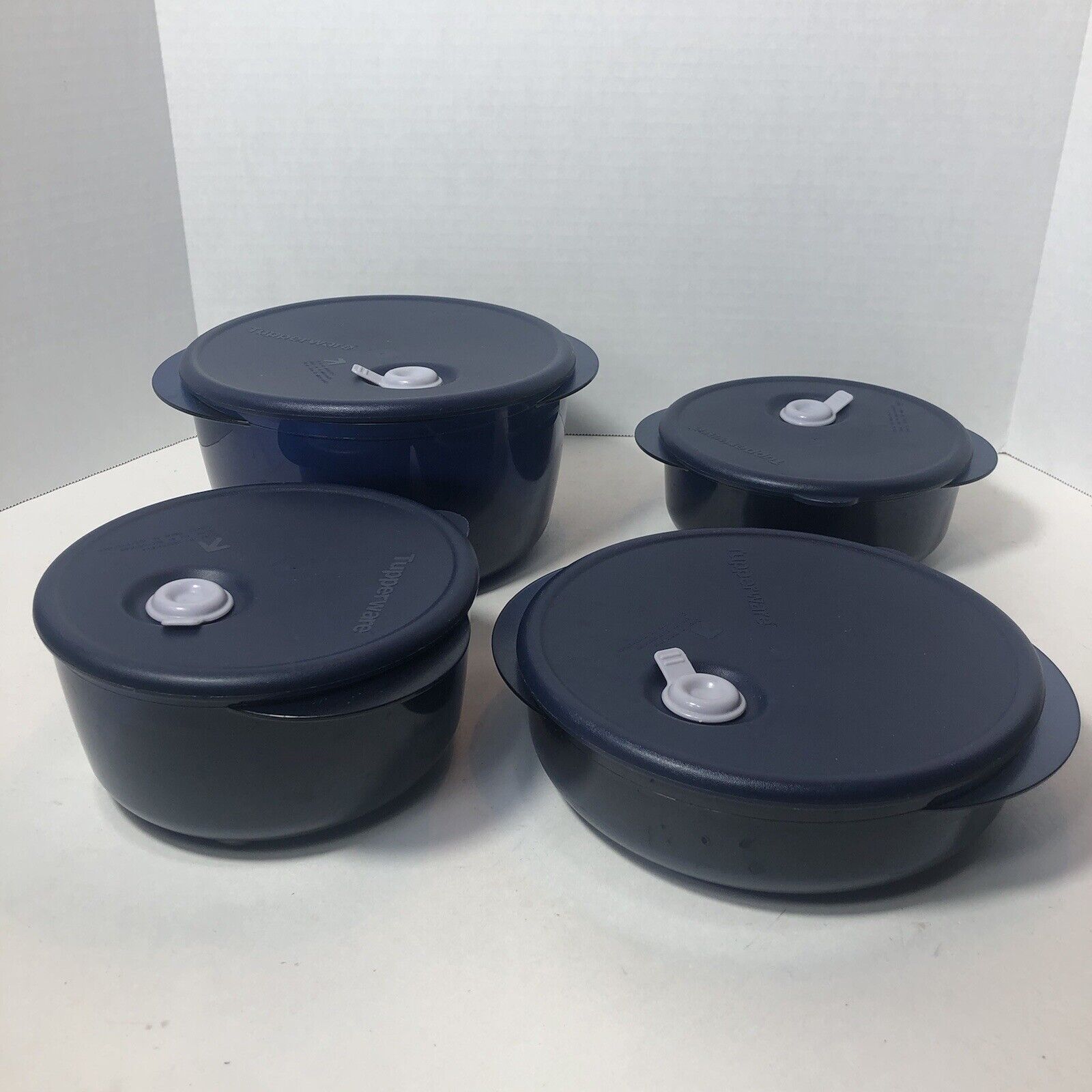 Tupperware Vent N Serve Lot of 4 Round Dark Blue Lids Cups 8.5  3.5  3.25  2.5