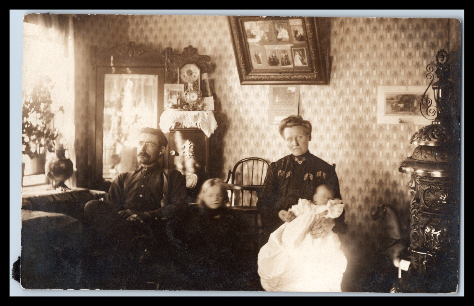 Vintage Sepia RPPC Family in fully furnished room Early 1900's