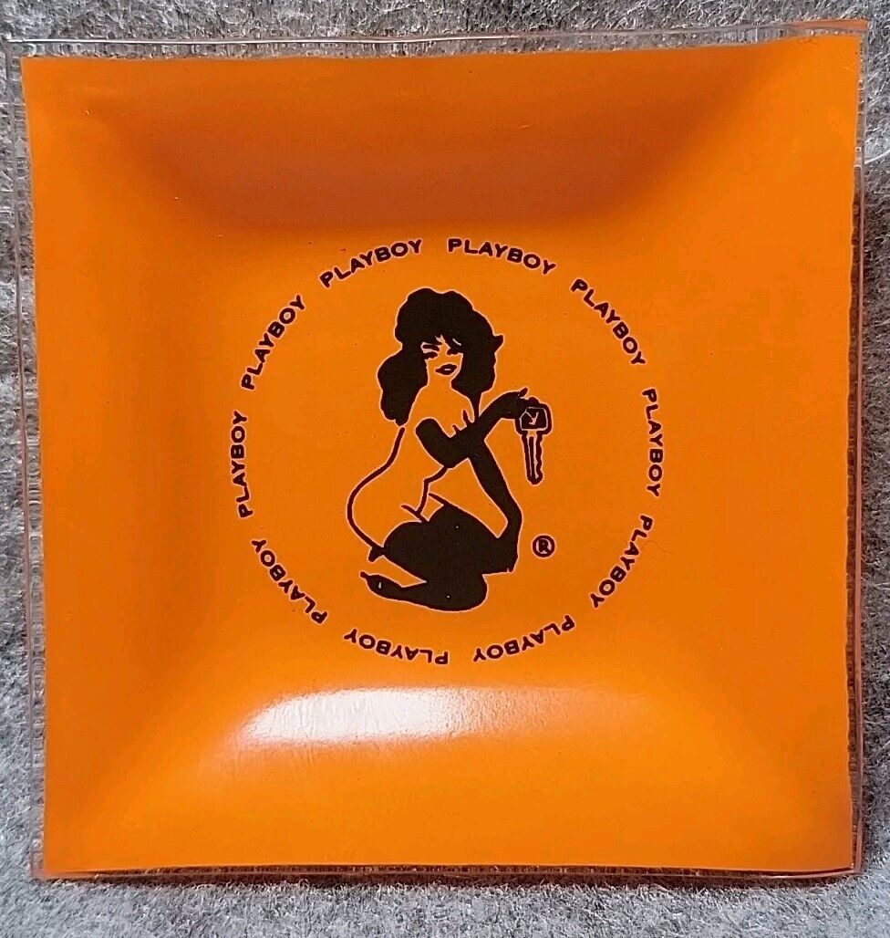 Vintage 60’s MCM “The Playboy Club”  Bunny Holding Key - Orange Glass Ashtray