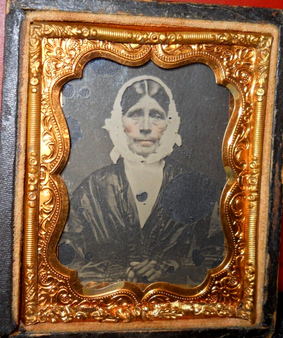 1/9th size Ambrotype of older lady in half case