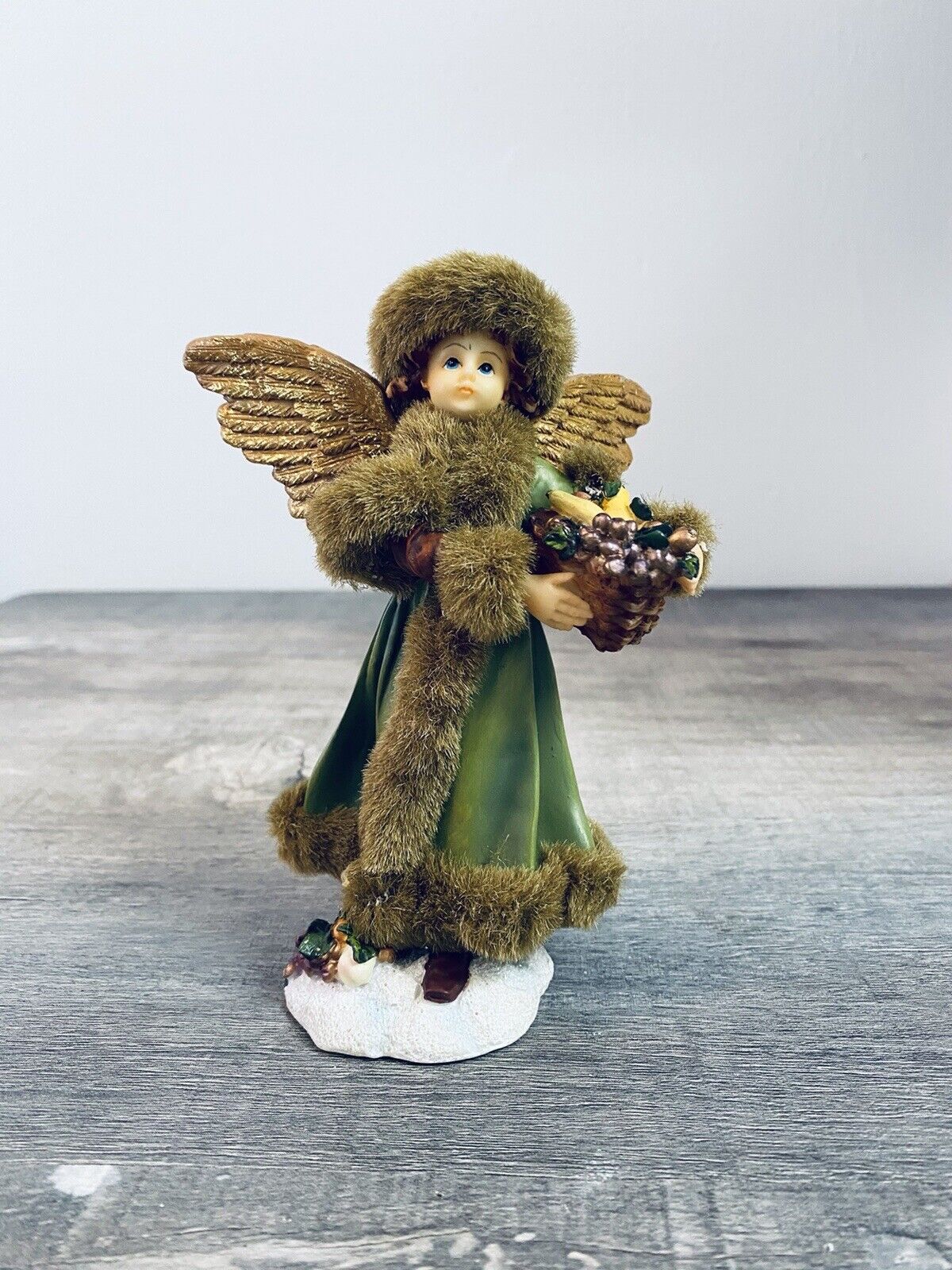 Vintage Resin Angel in Faux Fur with Fruit Basket Figure Figurine 