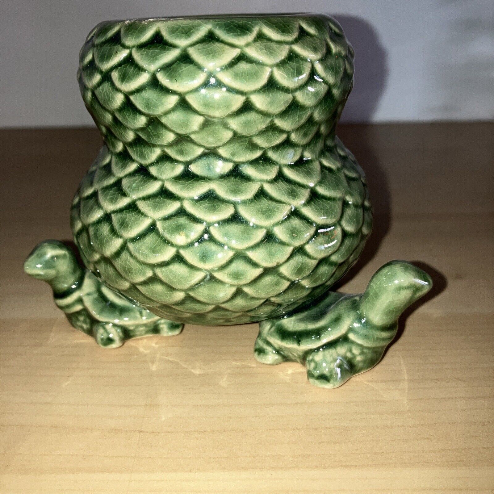 Green Porcelain Planter/Vase Being Carried By Three Turtles. 3.5 In Tall by 4in