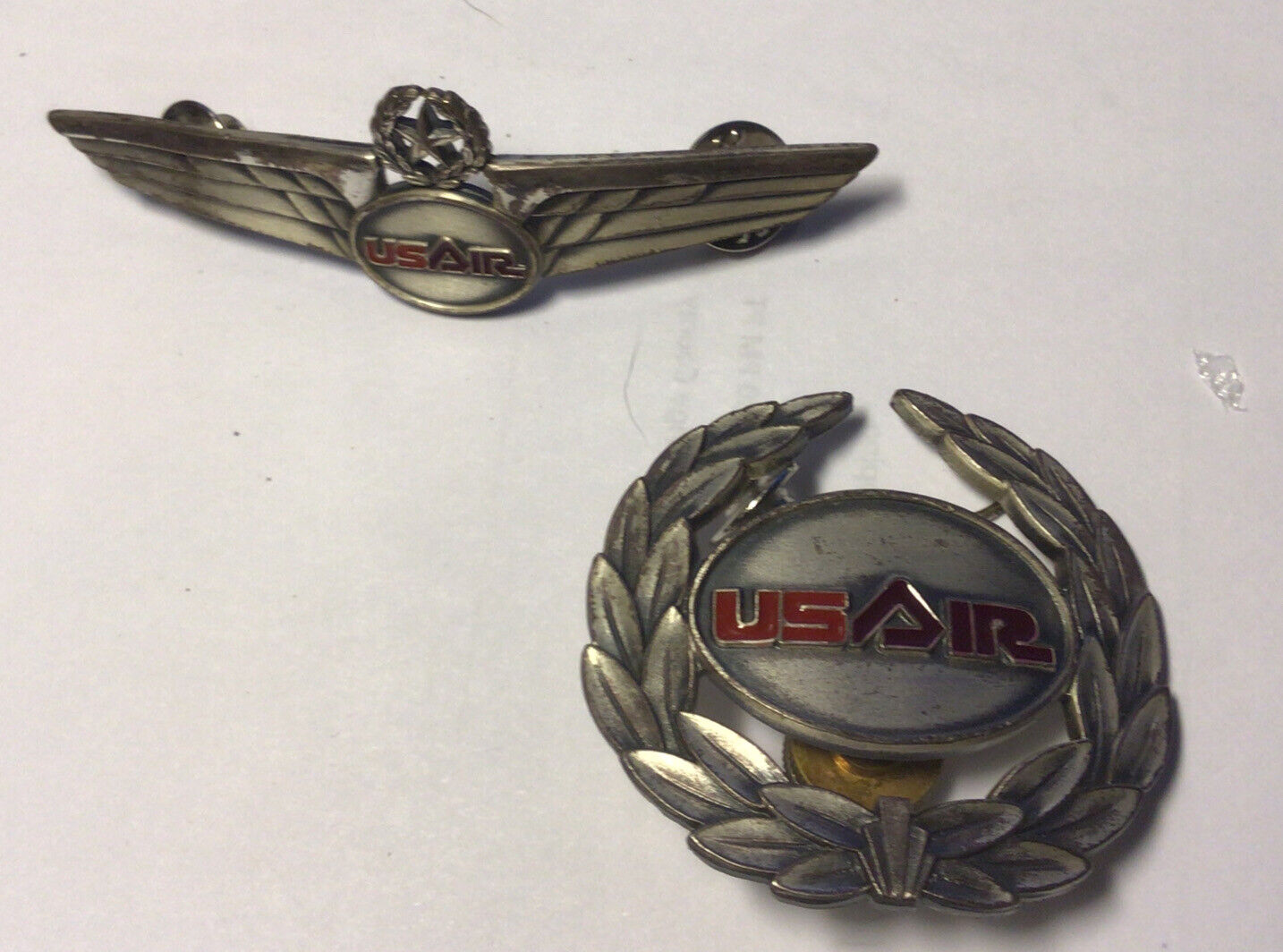 pair of metal US AIR airline pins by Blackinton
