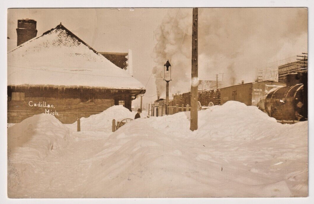 RPPC 1912 Postcard Cadillac Michigan Deep Snow Scene Train Leaving Station