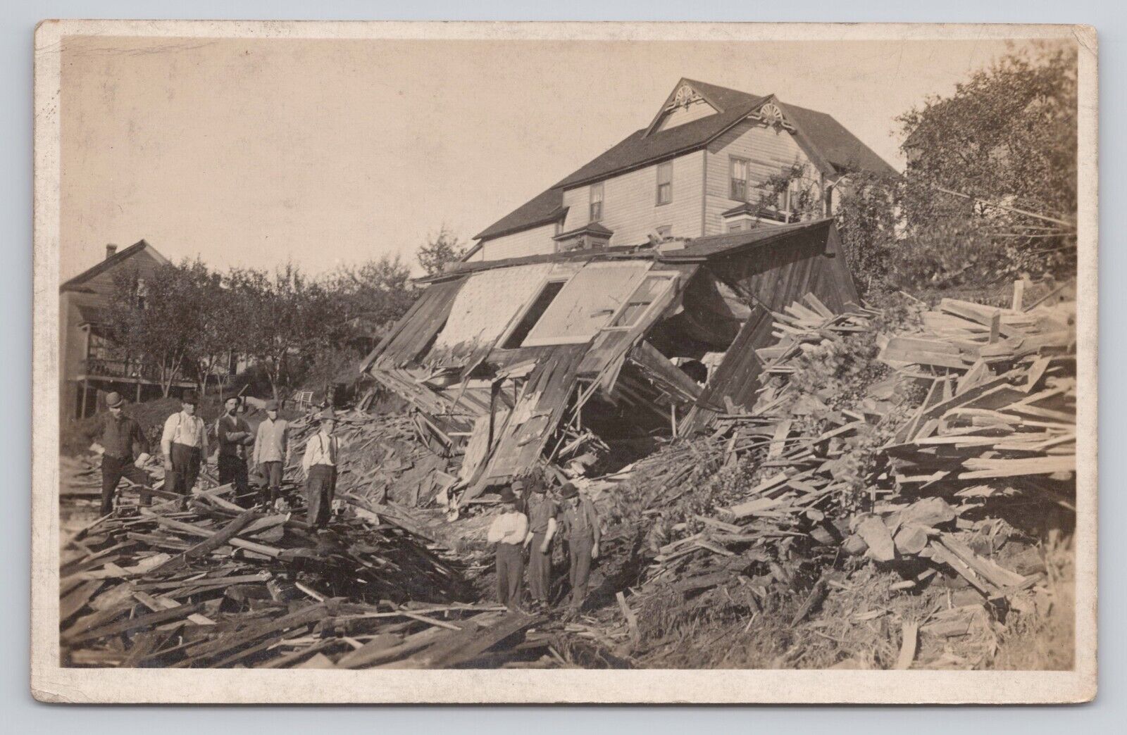 Postcard RPPC Disaster Collapsed Buildings c1907 Men w hats suspenders pose