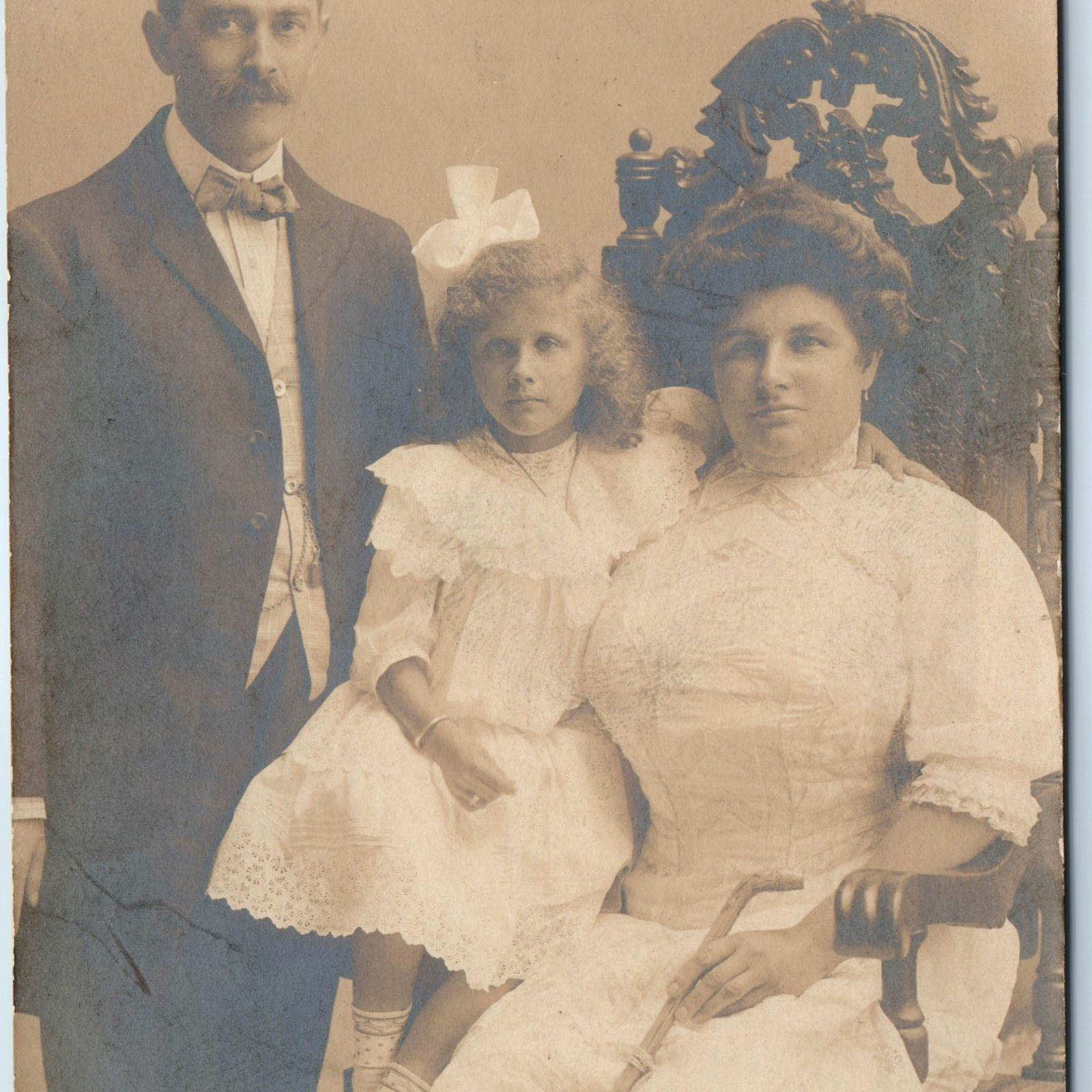 c1910s Sharp Family Portrait RPPC Little Girl Mother Father Corset Woman PC A251