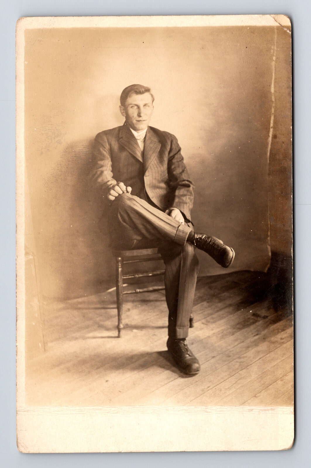 RPPC Portrait of Seated Man in Pin Stripe Suit Postcard